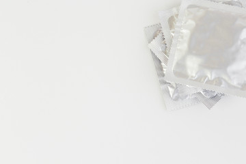 Condoms isolated on white background.