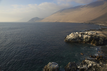White guano covered cliffs along the Pacific coast of northern Chile.