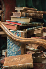 Vintage armchair with old books