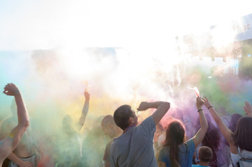 people covered with colored powder