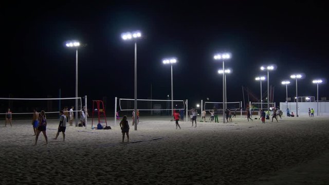 night illuminated dubai jumeirah beach park volleyball ground panorama 4k uae
