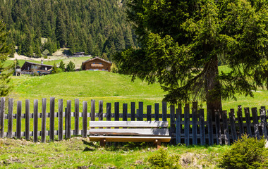 wooden bench in the mountains