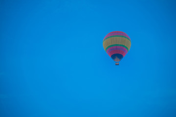 Fototapeta na wymiar The balloon on the blue sky morning. subject is blurred.