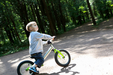 Naklejka premium Kid on balance bike