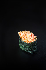 Gunkan Maki Sushi with Tuna isolated on Black Background