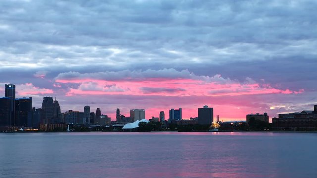 Timelapse of Detroit Skyline from Belle Island day to night 4K