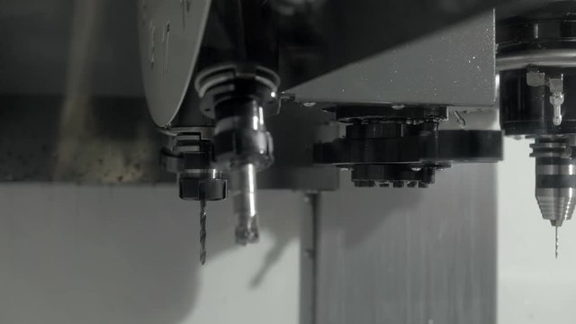 Close up computer numerical control working at metallurgical plant. Cnc lathe