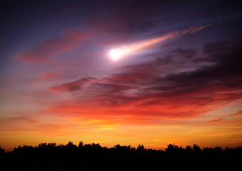 Comet in the sunset sky. Elements of this image furnished by NASA. - obrazy, fototapety, plakaty