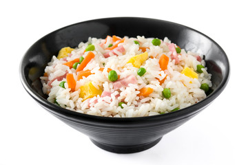 Chinese fried rice with vegetables and omelette in black bowl isolated on white background

