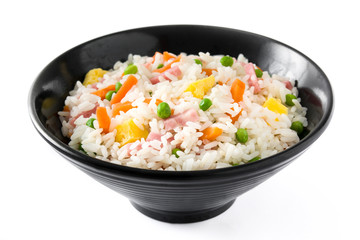 Chinese fried rice with vegetables and omelette in black bowl isolated on white background

