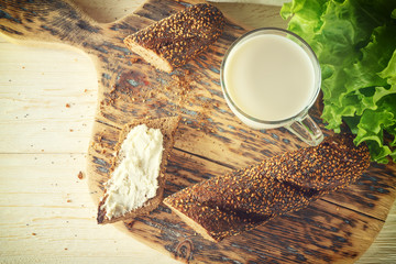 breakfast: glass of milk and loaf