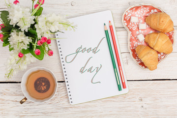 Breakfast and an inscription in a notepad