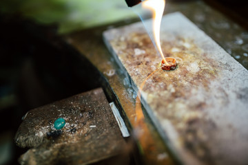 Goldsmith working on a ring