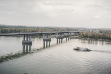 Naklejka premium The motor ship floats. River bus. The walking boat floats down the river.