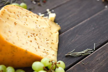 Gouda cheese with herbs closeup