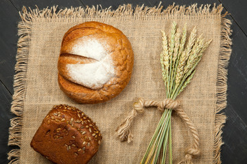 Homemade bread sourdough, rustic baked bread in wickerwork basket