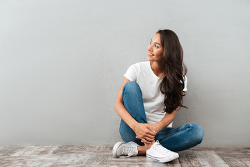 Attractive young asian woman sitting