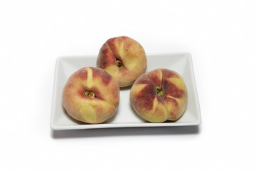 Peaches On A Plate Isolated On White Background