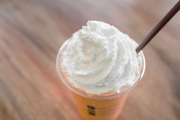 Thai tea frappe smoothie with wipping cream, sweet drink.