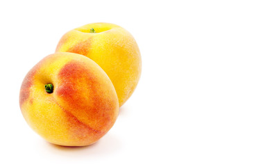Two peach Isolated on a white background. Summer juicy fruit. Healthy food. Bright juicy colors.