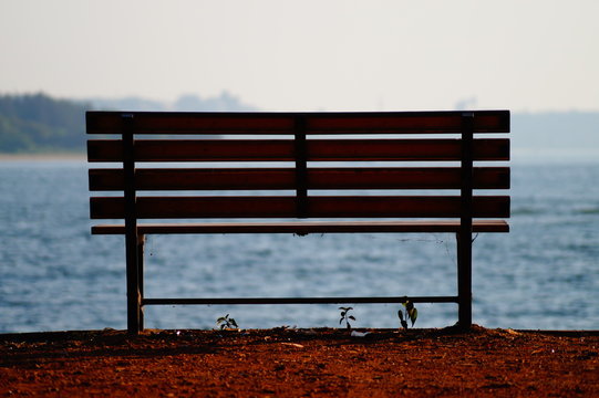 Lonely bench on the sea coast