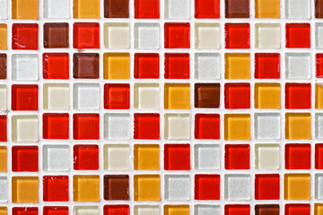 Mosaic tiles. colorful mosaic tiles pattern in red, orange, yellow and white (warm tone colors)