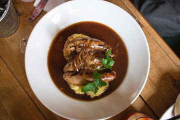 english sausages and mashed potato and gravy