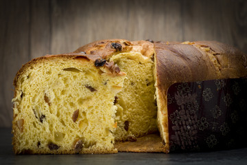 Panettone, sweet typical Italian Christmas on holiday background