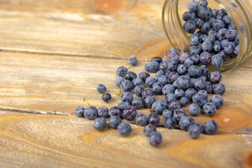 Blueberry on wooden table background, bowl of blueberries. .Antioxidants, detox diet, organic fruits. Berries