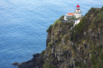 Fototapeta na wymiar Lighthouse on Ponta do Arnel, Nordeste, Sao Miguel Island, Azores Islands, Portugal.