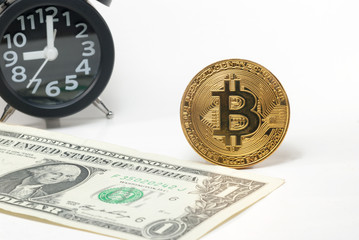 Bitcoin,Banknotes and black alarm clocks