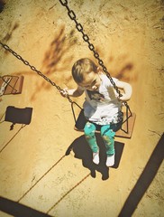 Little girl on the swing