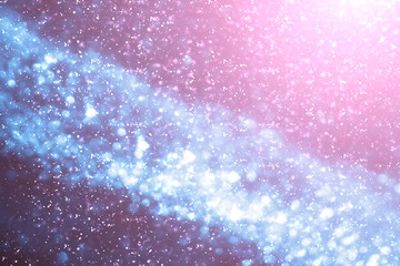 Abstract round  bokeh or glitter lights on blue background. Circles and defocused particles