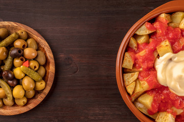 Patatas bravas and olives, Spanish tapas with copy space