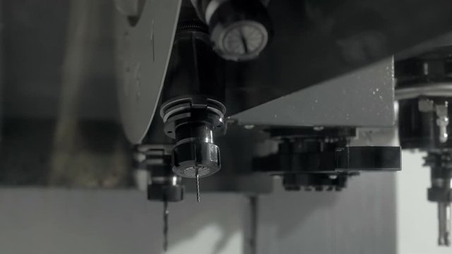 Close up computer numerical control working at metallurgical plant. Cnc lathe