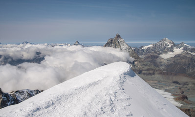 Scenic Matterhorn peak as seen from Breithorn glacier above Zermatt