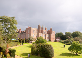 big garden with people sun light overcast empty sky melford hall long melford mansion manor england suffolk