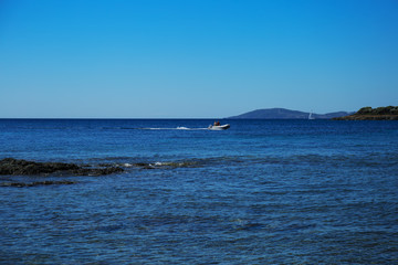 Sea view from beach with sunny sky.Summer rest on the beach of Greece.