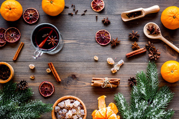 Celebrate new year winter evening with hot drink. Mulled wine or grog ingredients. Wooden...