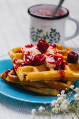 Delicious home made desert with waffles, fruits and ice cream