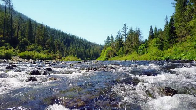 Drone Flying Low Over Stream of Water 4K