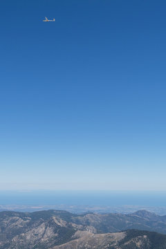 view of the sailplane flying over the mountains of Corsica