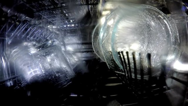 Inside view on washing of ware in the dishwasher