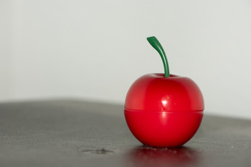 Full Body for Red Apple on Black Counter