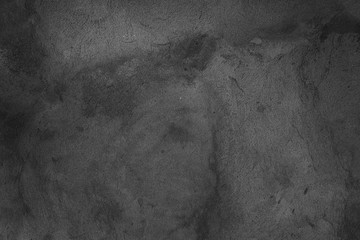Cement plaster on the wall. Monochrome photo.