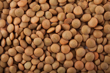 Raw lentils and rice with chilli pepper.