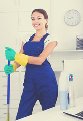 Woman cleaning at company office