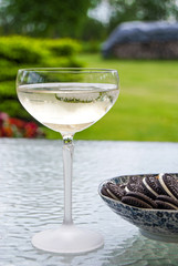 Oreo cookies and a glass of sparkling wine (champagne)