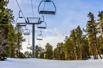 looking up at a ski lift at a resort 