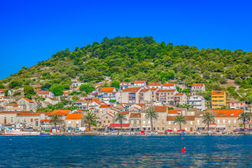 Naklejka premium Vis island summer landscape. / Seafront view at picturesque ancient village on Island Vis, summertime in Croatia, Europe.